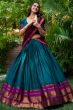 Teal Blue Silk Lehenga.