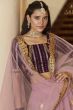 Pastel Pink Embroidered Flared Net Lehenga