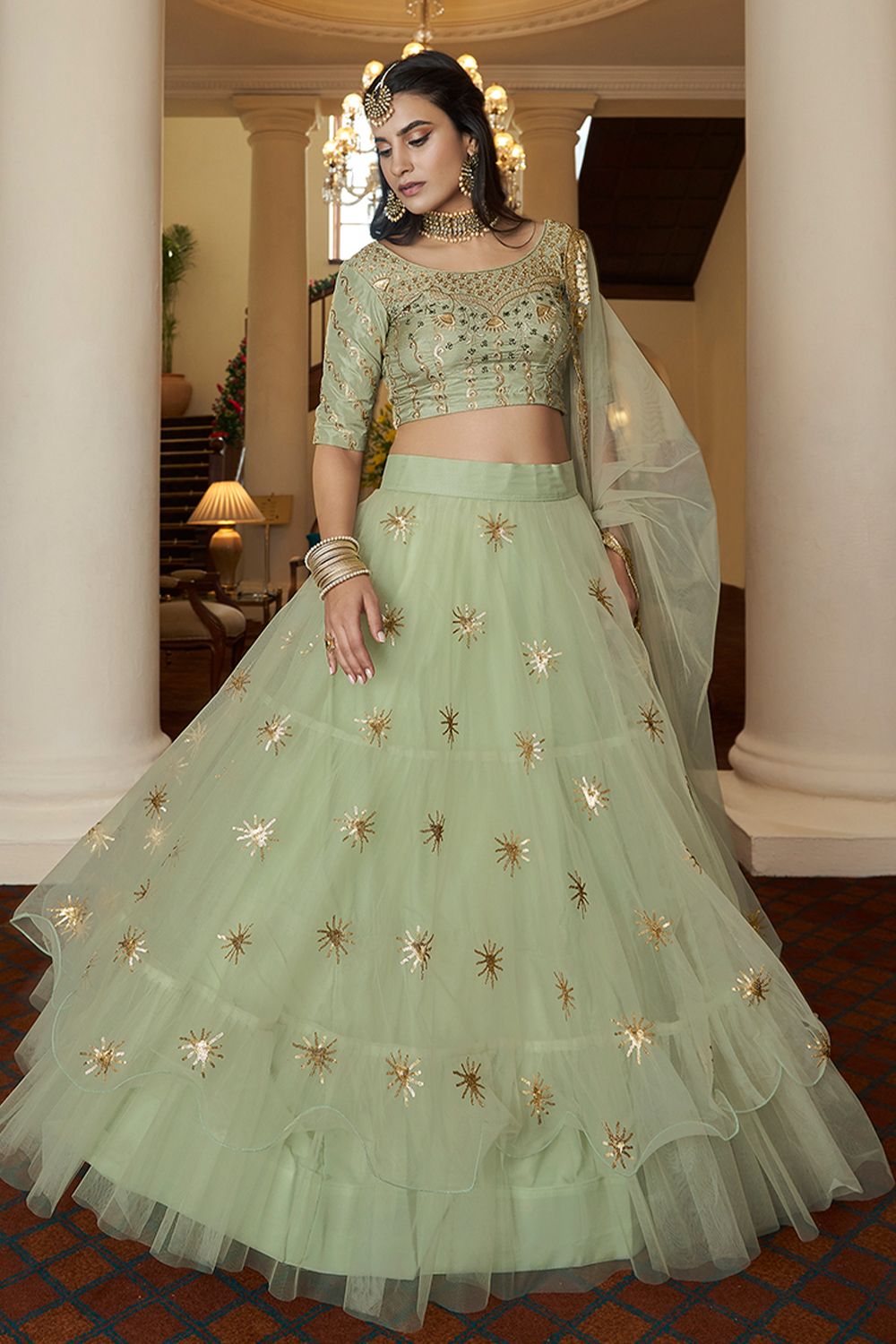 Mint Green Embroidered Flared Net Lehenga