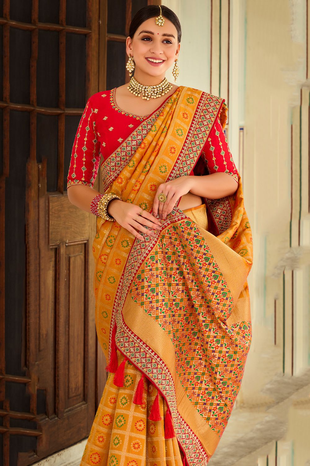 Yellow Silk Printed Saree with Tassels