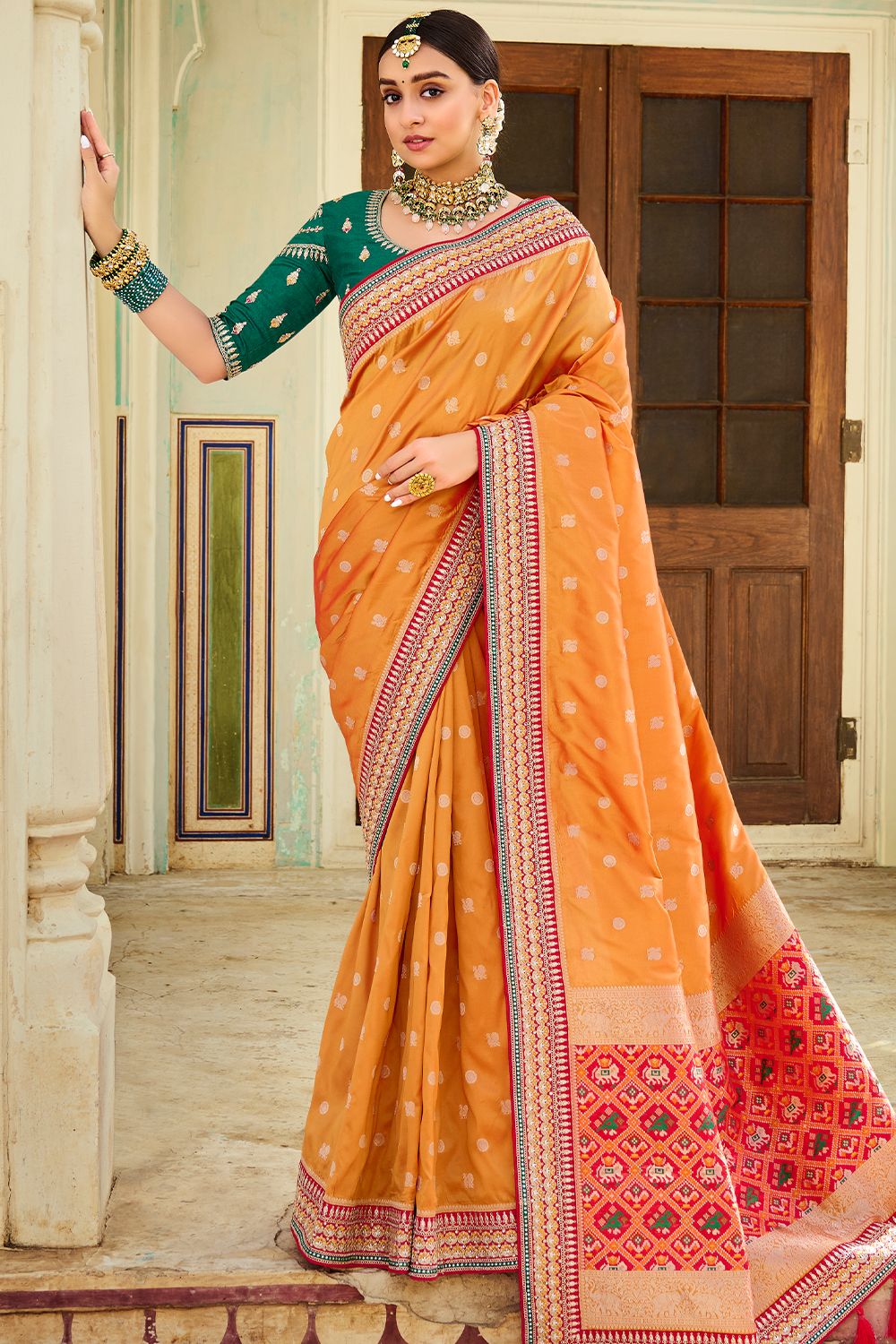 Pastel Orange Silk Printed Saree with Tassels