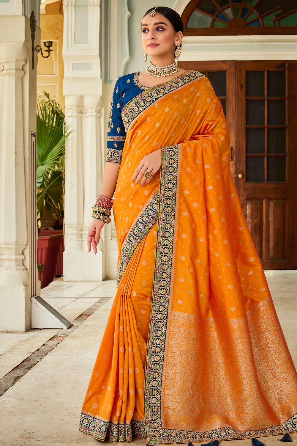 Birght Orange Silk Printed Saree with Tassels